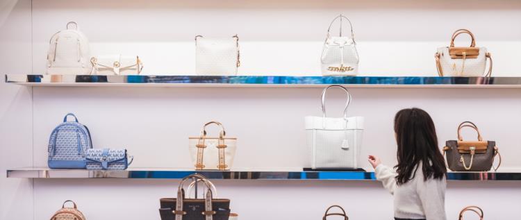 A woman browsing the duty free shop at YVR