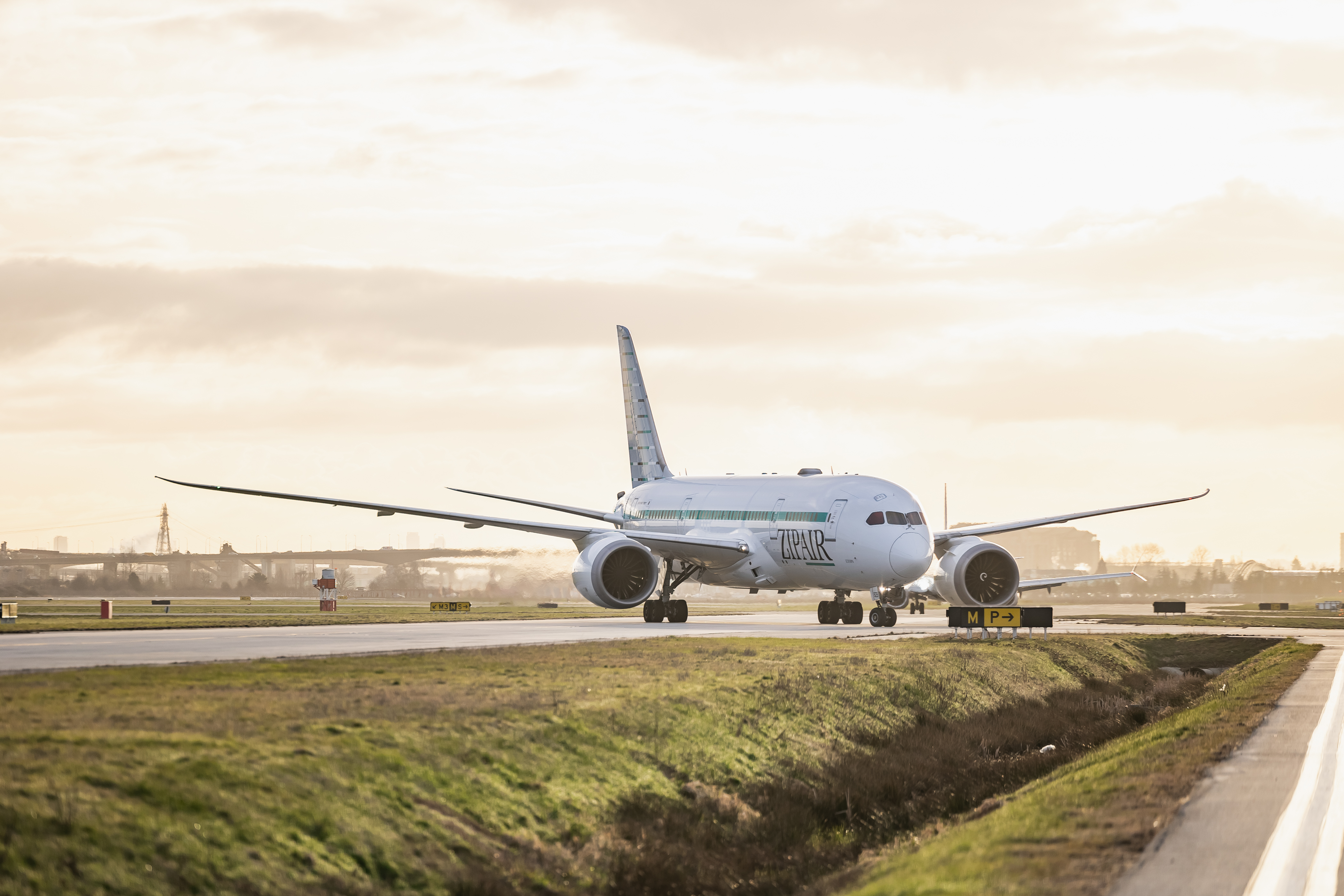 photo of an airplane taxi-ing on the runway at yvr